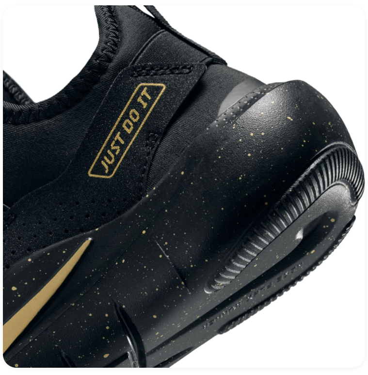 Nike Slip-On Sneakers – Black & Gold with Speckled Sole