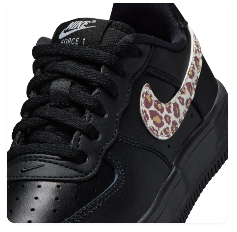 Nike Low-Top Sneakers – Black with Leopard-Print Swoosh