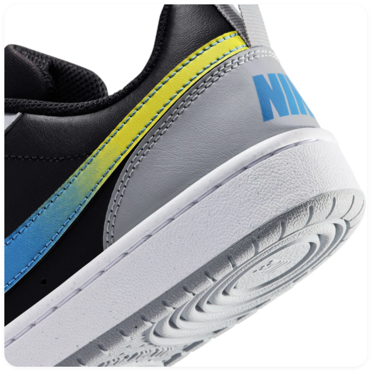 Nike Low-Top Sneakers – Black & Light Grey with Blue-to-Yellow Swoosh