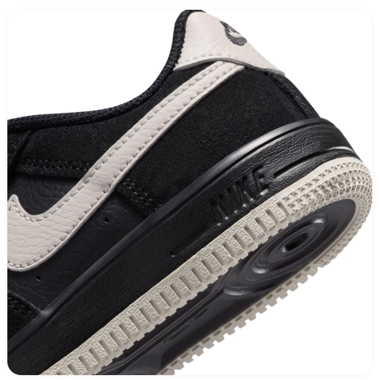 Nike Low-Top Sneakers – Black & Cream with Textured Details